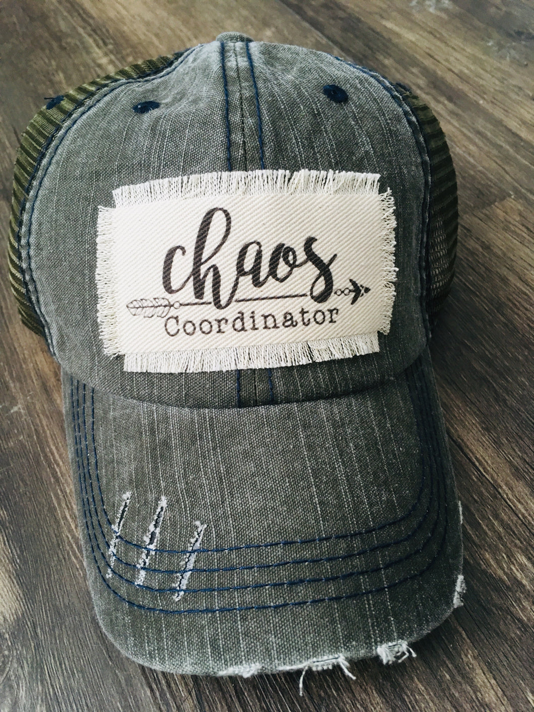 Olive Hat. Chaos Coordinator